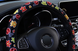 Чехол на руль автомобиля,ткань с принтом,36-39 размер, бархат, черная с цветочками и солнышками)